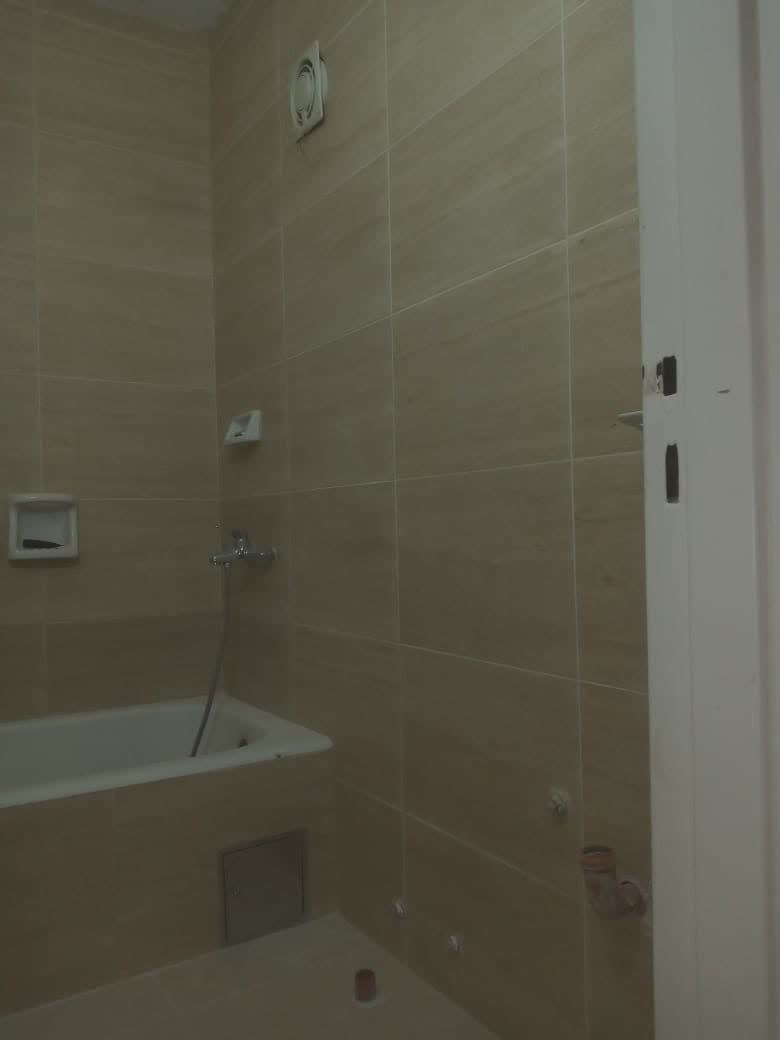 Baño revestido con bañera